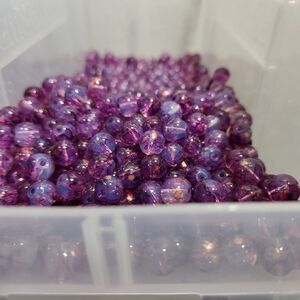 10mm glass beads. Purple base ink splatter beads